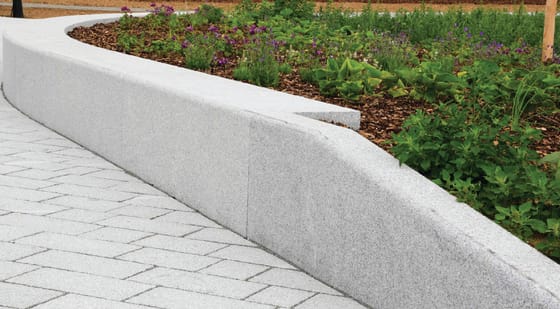 modern poured concrete retaining wall 