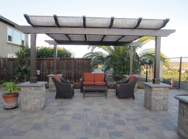 Modern pergola covering a patio seating area.