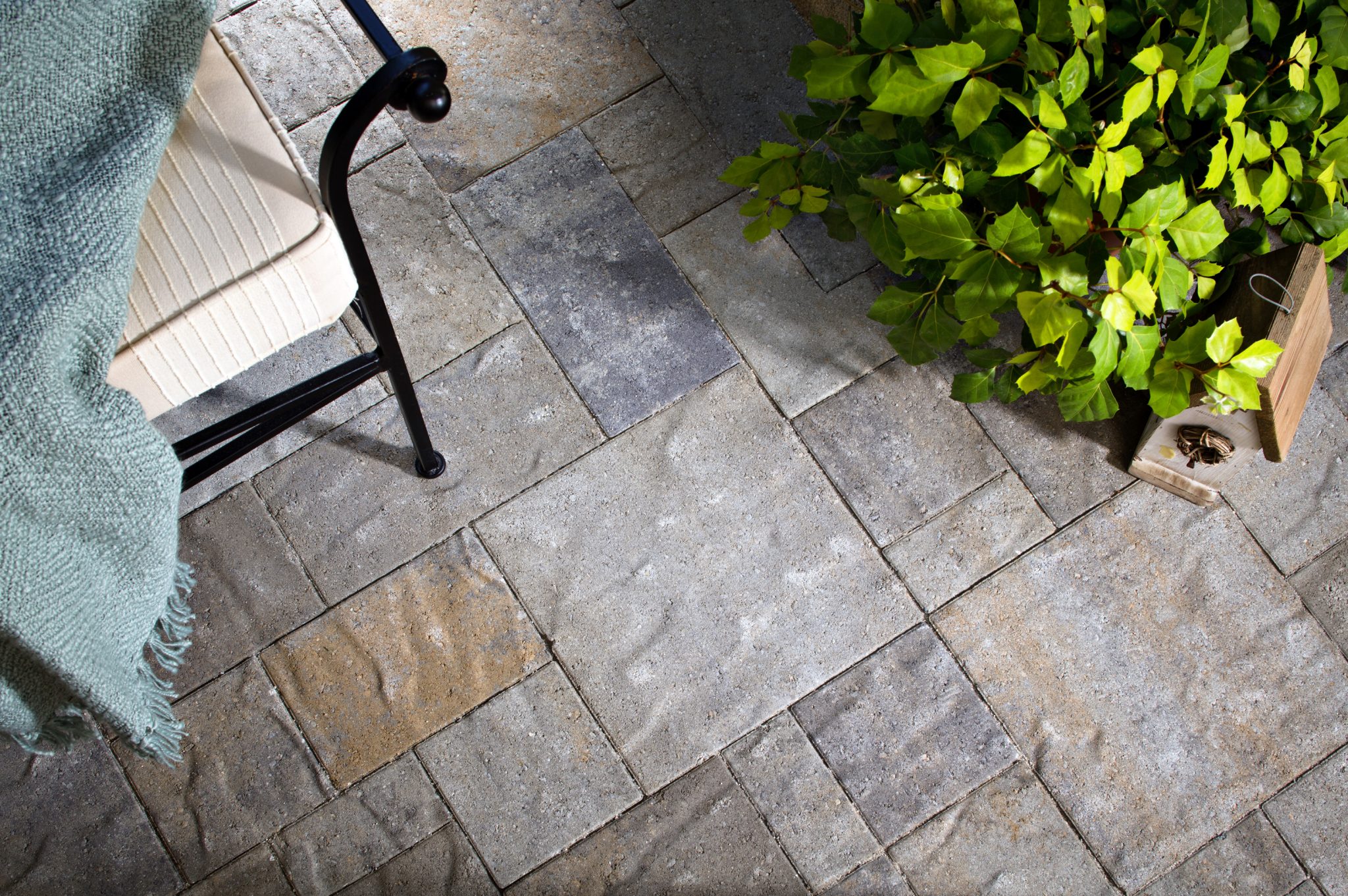 paving stones over stamped concrete