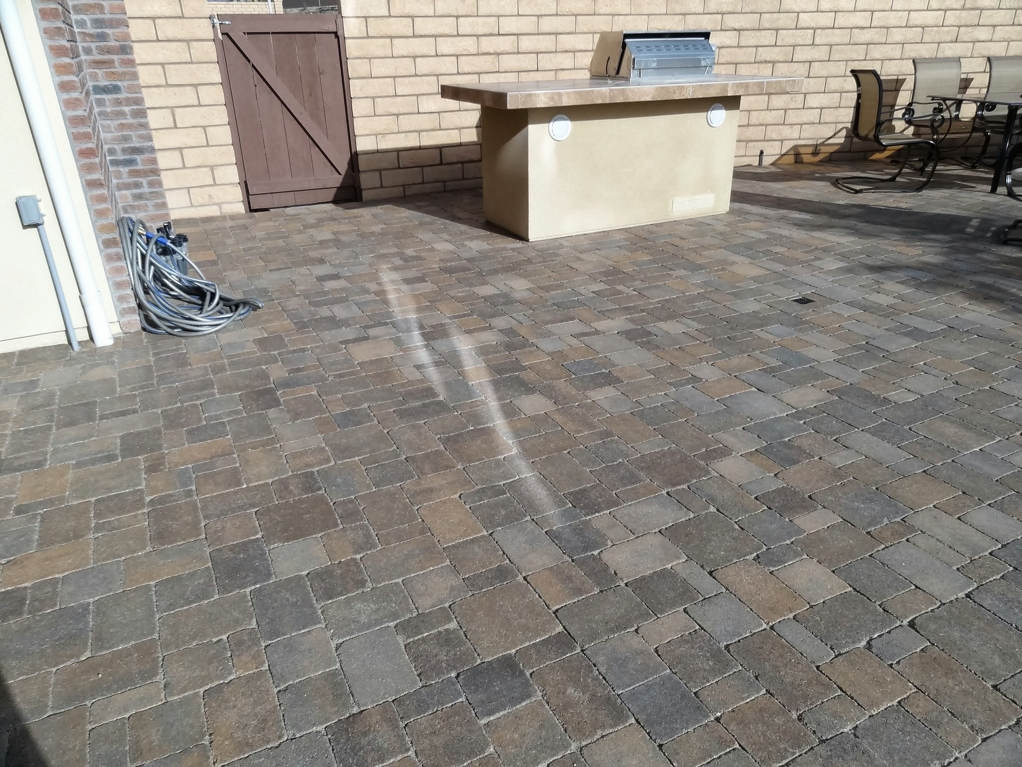 Energy Efficient Windows reflection on paving stones