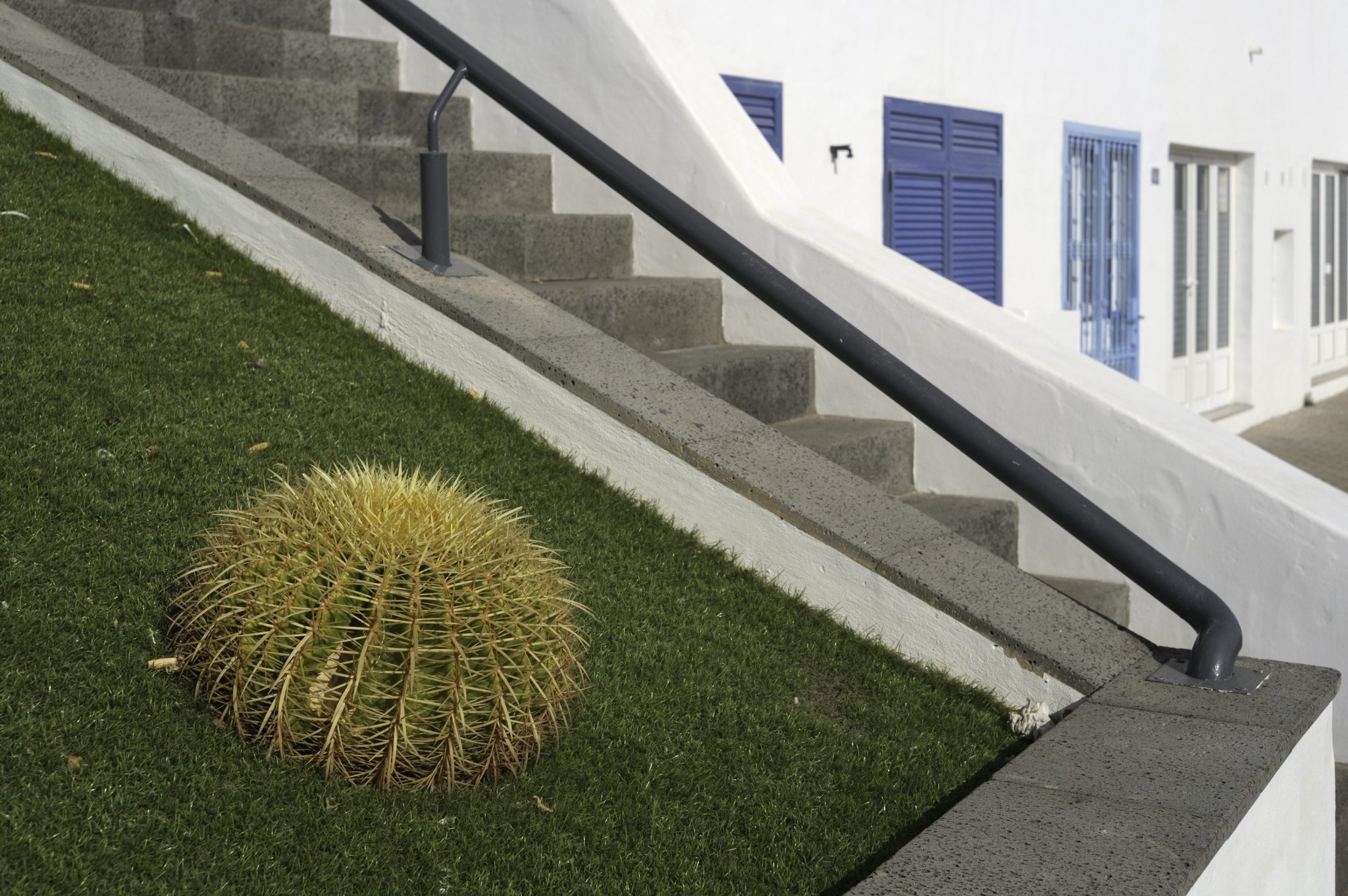 installing artificial grass on a slope