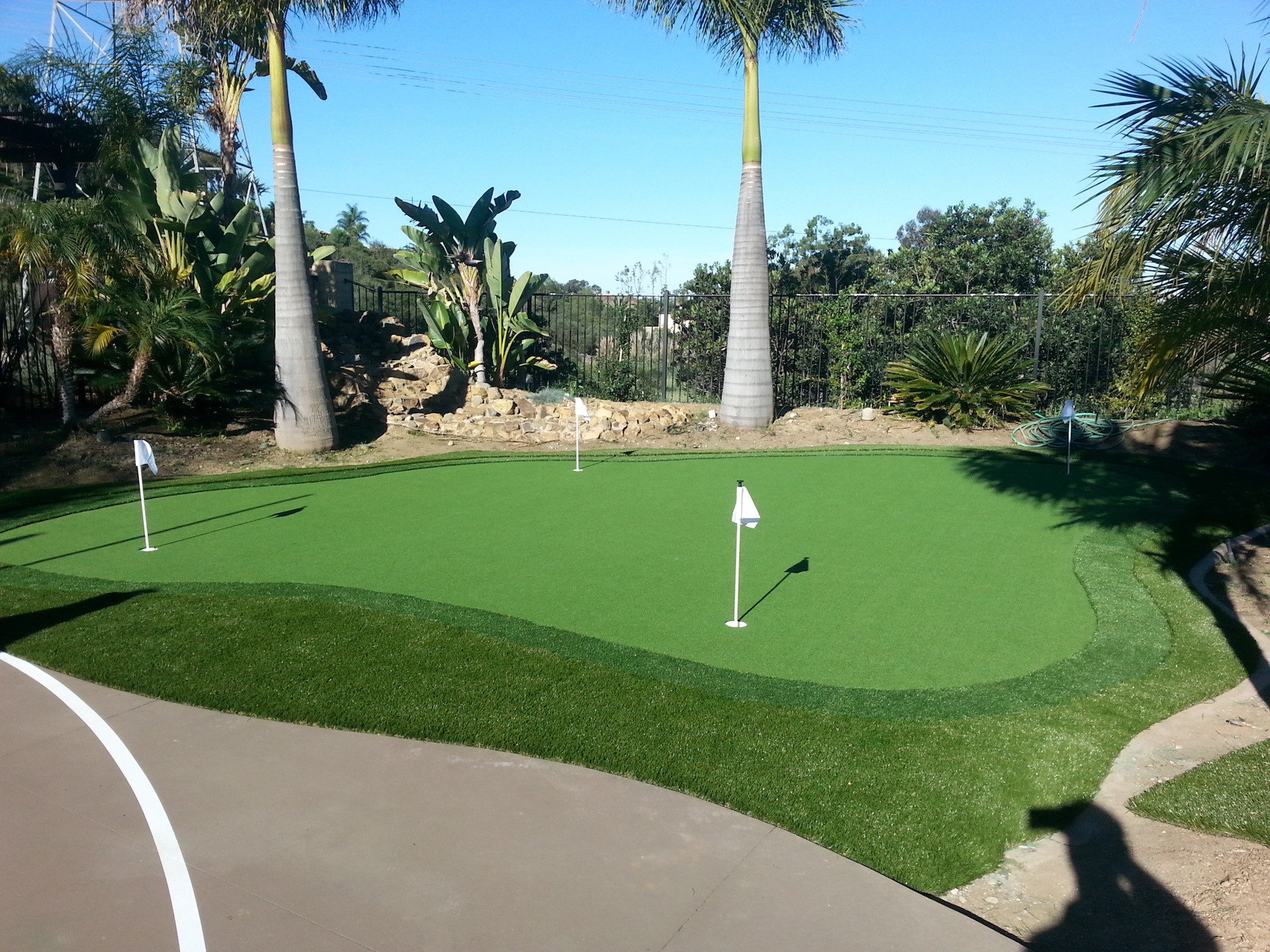 Backyard putting green installed by Install-It-Direct