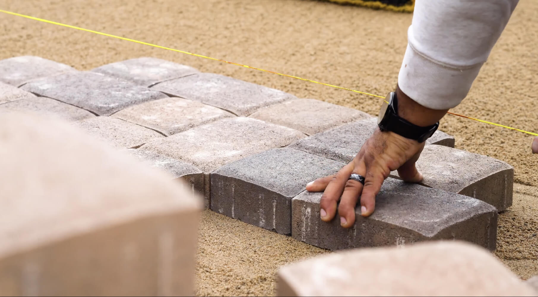 paver installation step 3 lay down pavers