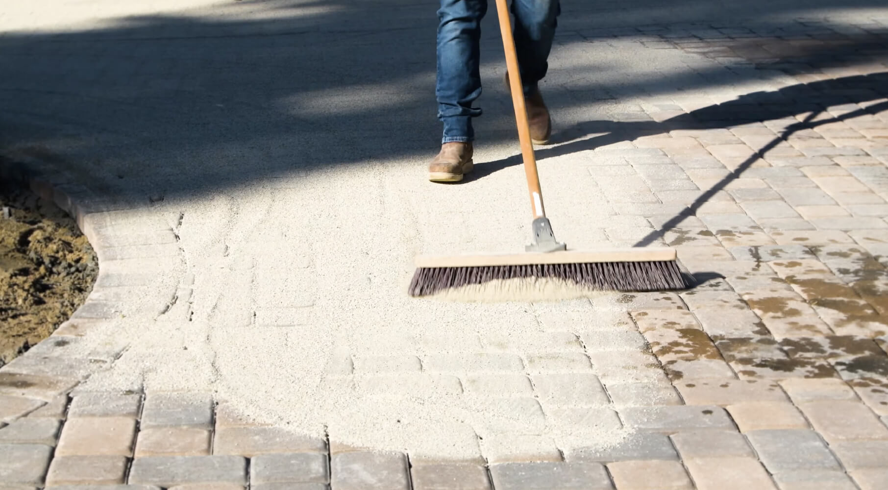 paver installation step 5 add joint sand and compact it