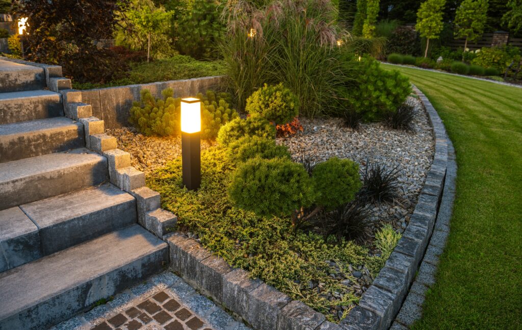 Landscape lighting and greenery next to paved outdoor staircase in La Mesa. 