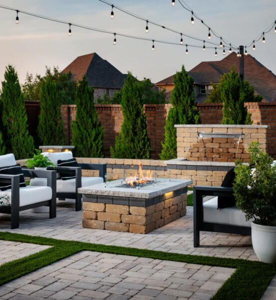 Backyard landscape design in La Mesa featuring a fire pit and pavers. 