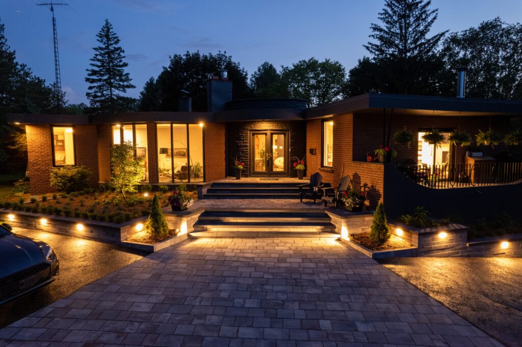 Nighttime view of landscape lighting on a home in Scripps Ranch. 