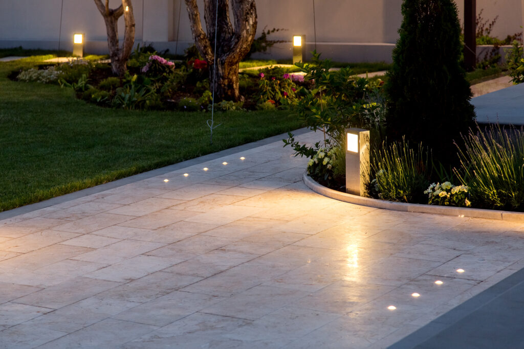 Landscape lighting of a paved driveway in Fairbanks Ranch, CA.