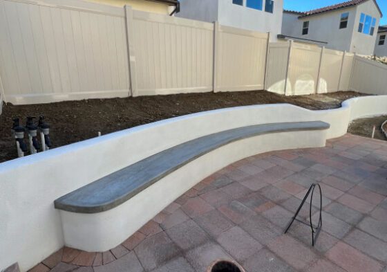 Built-in bench on retaining wall at 92078