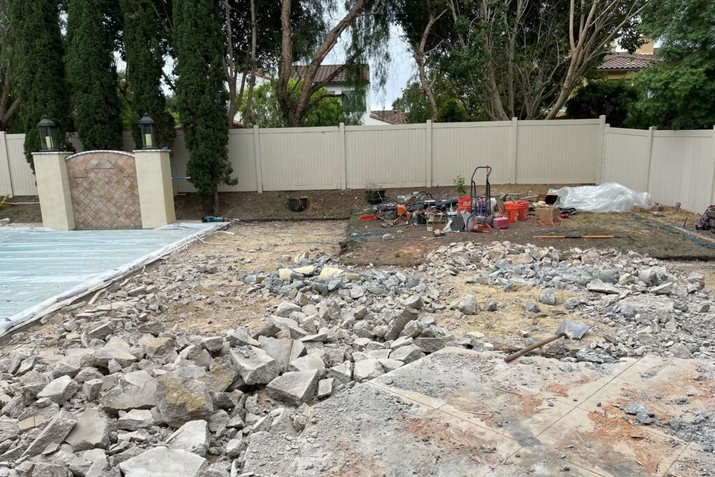 Before Garden Retaining Wall + Fireplace + Patio Pavers in Rio Rancho, San Diego, CA 92127