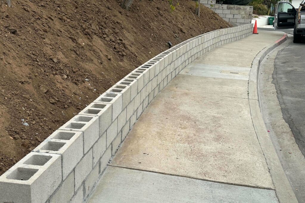During Front Yard Remodel + Retaining Wall + Decorative Plants in San Diego, CA 92110