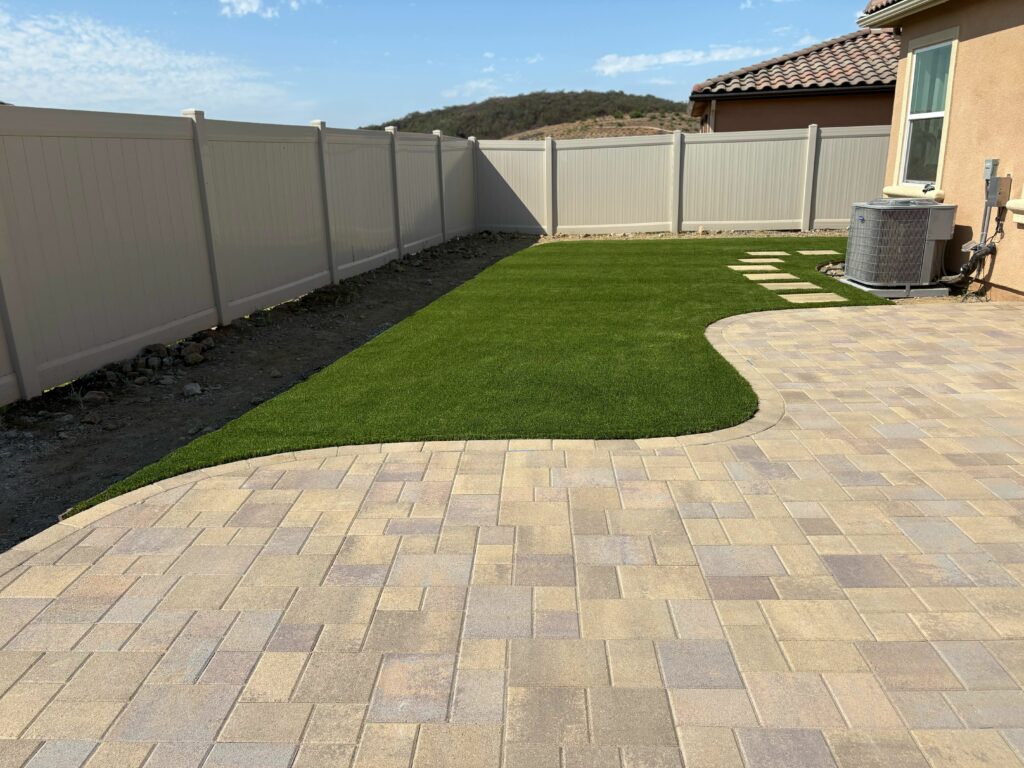San Marcos Backyard Pavers + Turf + Drainage (San Elijo Hills) Before Photo After 1