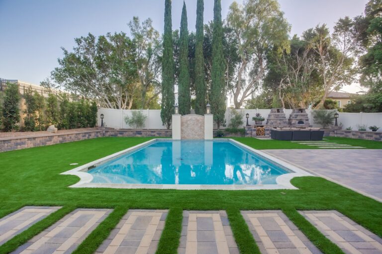 Centered pool with stepping stones.