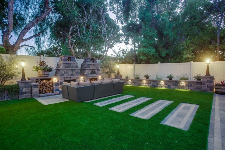 Lit stepping stones and lounge.