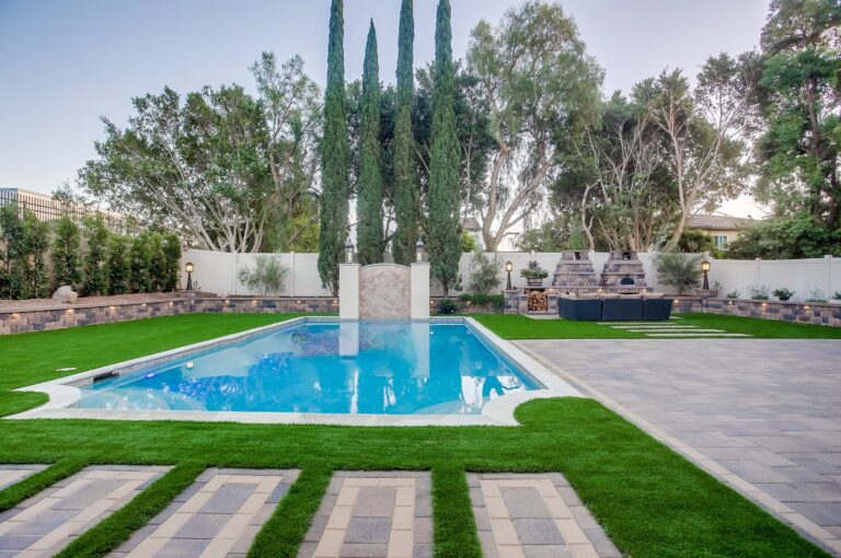 Pool and patio in evening light.