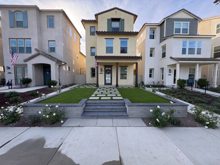 Front yard of a townhouse showing a completed hardscape and landscape installation. Escondido project by Install It Direct.