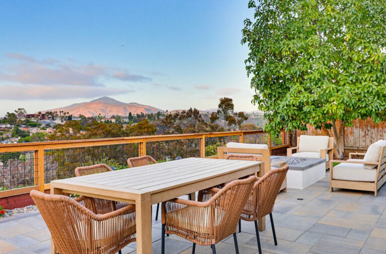 Dining set framed by Mount Miguel at golden hour on new pavers