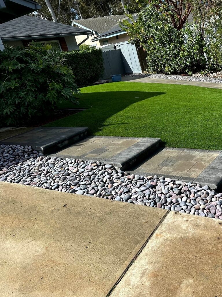 15 linear feet of bullnose paver treads handling the grade change between front yard and door, Tierrasanta.