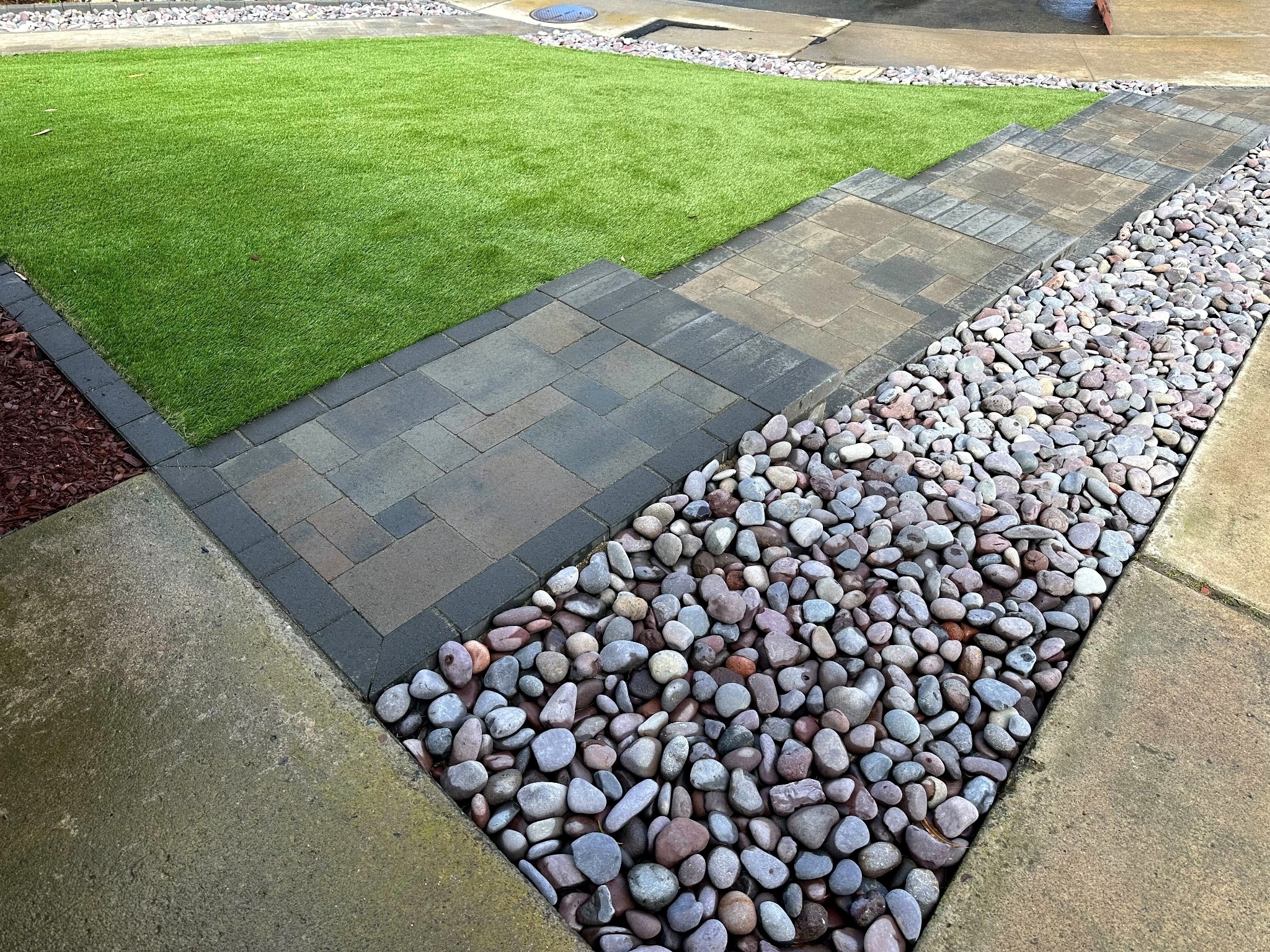 550 sf of SiteOne Turf1 Rye synthetic turf — 1.5 in pile, olive/tan blades — across the Tierrasanta front lawn.