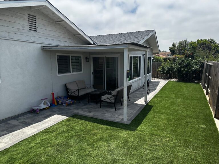 Pavers continue under the covered patio