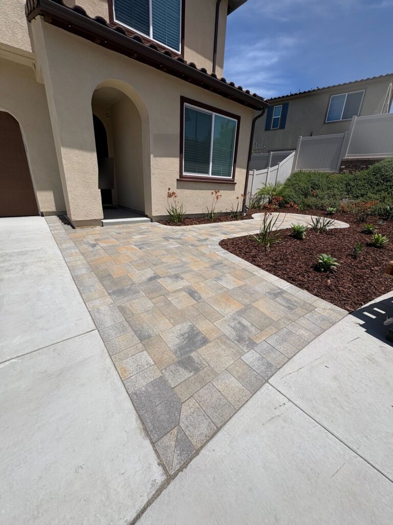 Pavers at the front entry with new planting